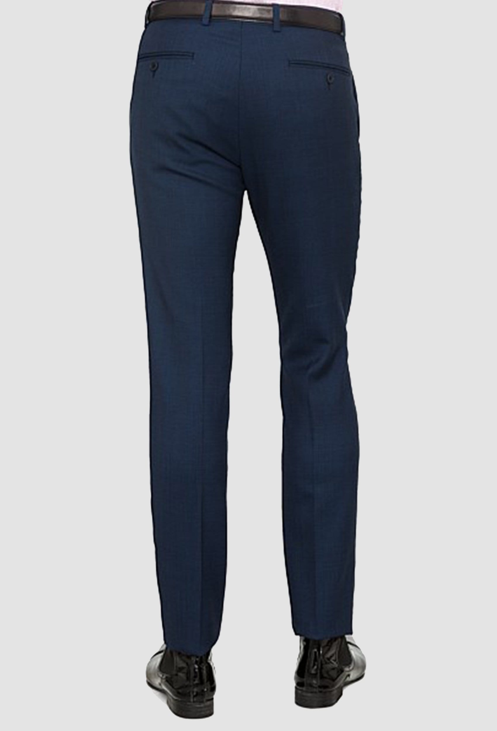 a back view of the ted baker slim fit rajah Birdseye trouser in navy pure wool including the back button welt pockets
