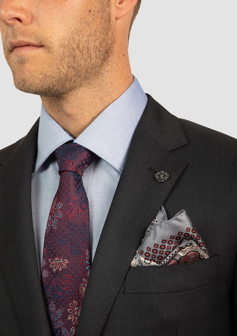 the peak lapel and front pocket detail in charcoal pure wool FCI417
