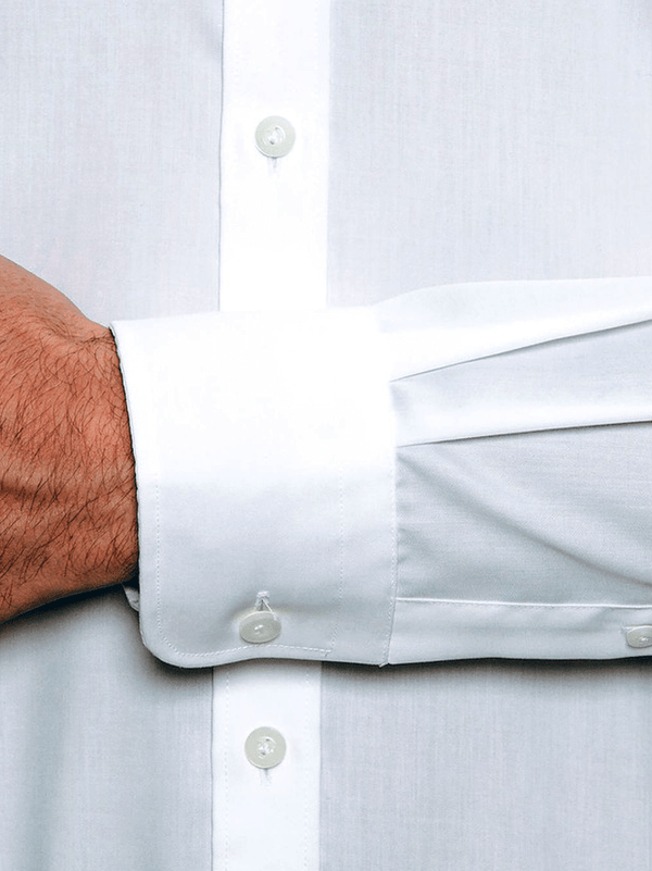 a close up of the regular cuff detail on the cambridge preston mens business shirt in white pure cotton. 