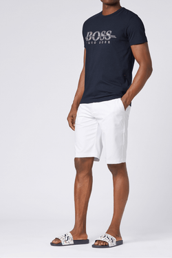 the navy hugo boss mens crew neck tshirt worn with a boss slides and white shorts