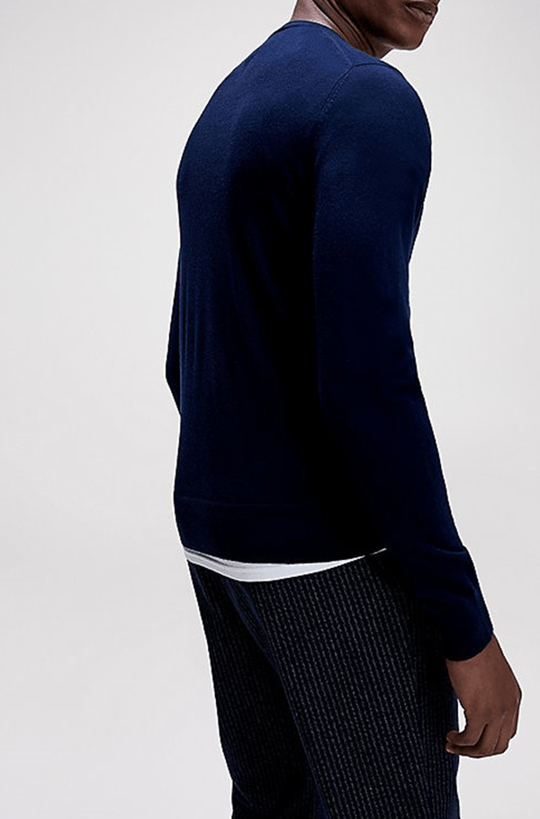 a side on view of the Tommy Hilfiger classic fit luxury wool mens crew neck jumper in navy TT0TT06521_DW5