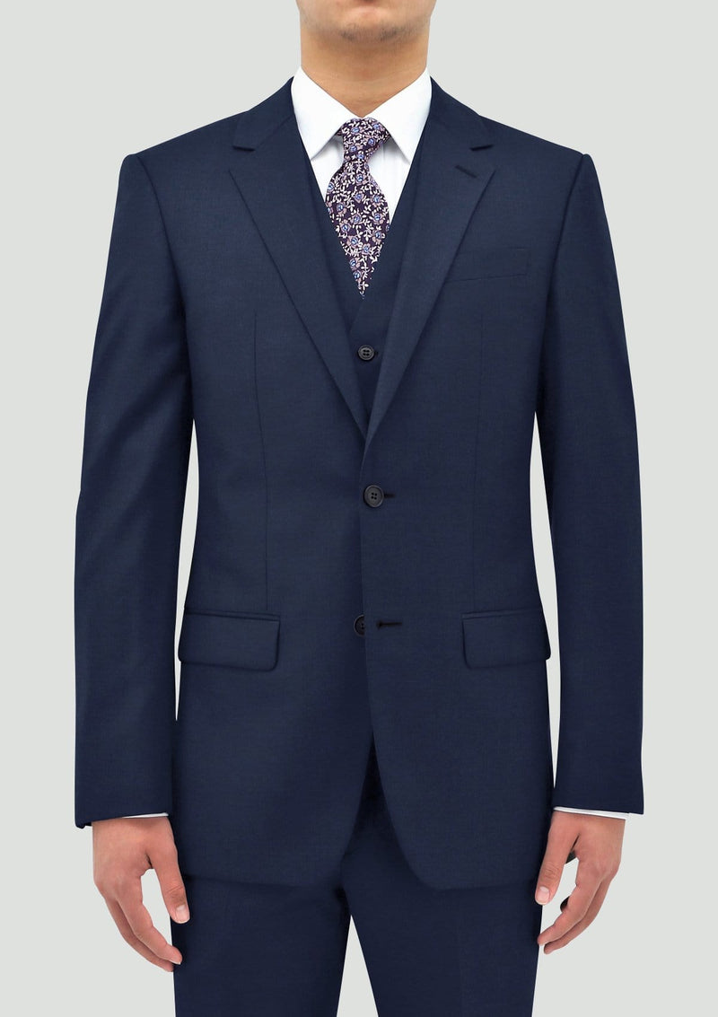the Daniel Hechter slim fit ryan vest in blue pure wool layered under the shape suit jacket DH106-15