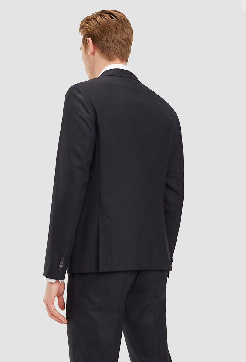 a back view of the slim fit Tommy Hilfiger virgin wool suit blazer in black